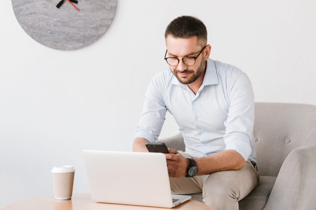 Photo Of Business Man Wearing Eyeglasses Sitting PB3SK4U 1024x683